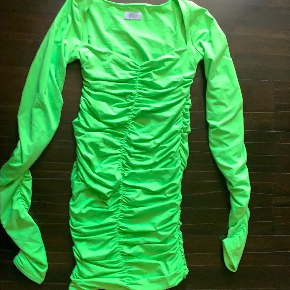 Green dress. The Model in yellow version